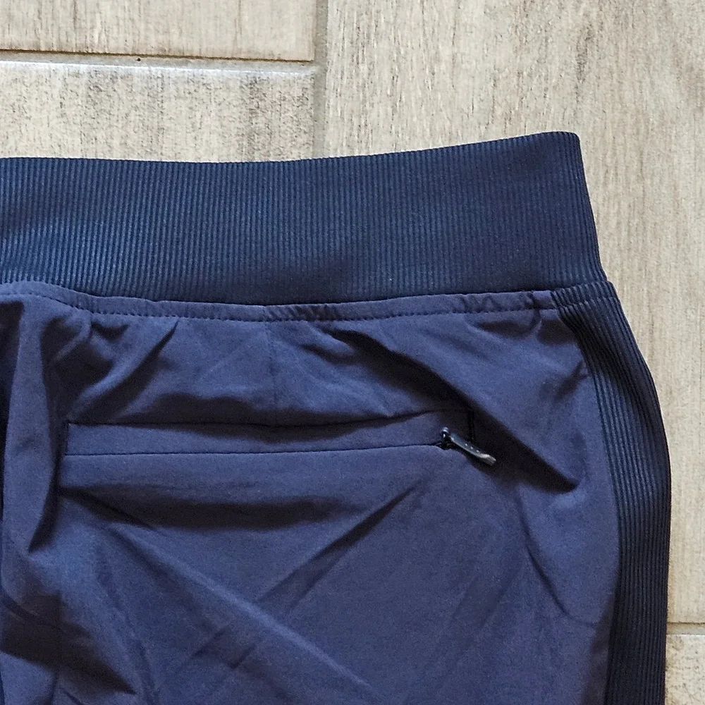 Athleta Brooklyn Mid Rise Ankle Pant Size 10 Navy Blue Tapered Ribbed Panel Slit